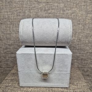 Elegant Silver Necklace with Gold Pendant